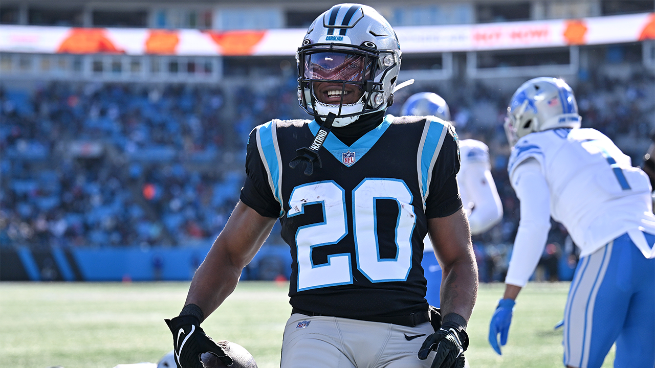 Panthers accumulate 320 rushing yards and three touchdowns in 37-23 victory over Lions