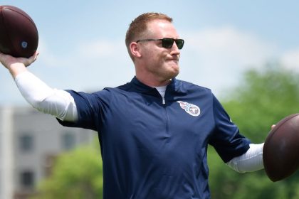 Titans fire four assistants, including OC Downing