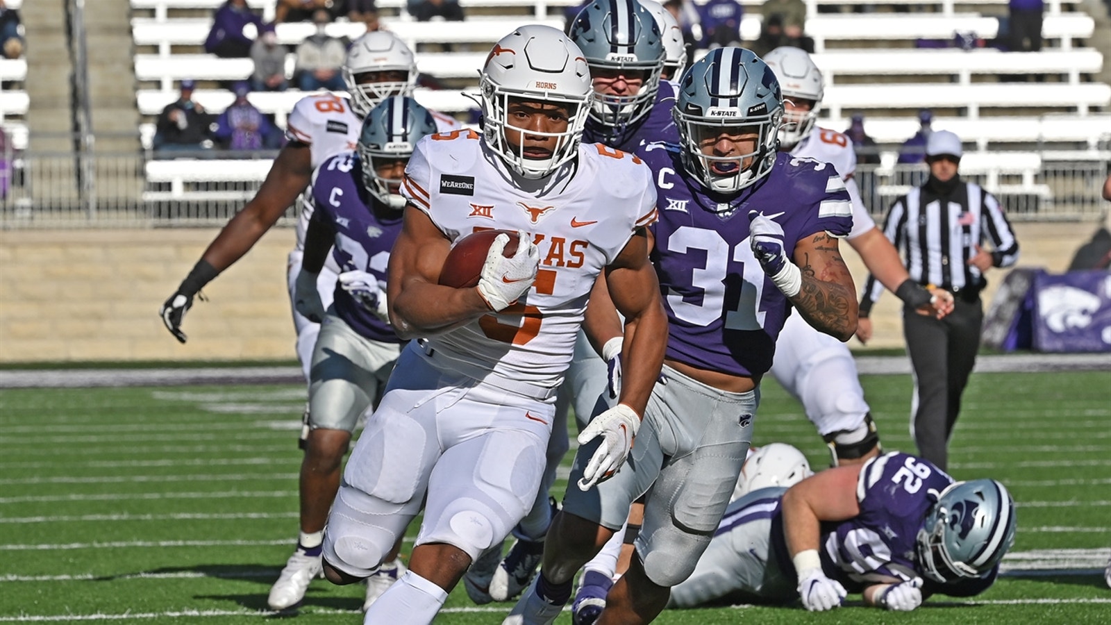 Bijan Robinson, Roschon Johnson fuel Texas in 69-31 thrashing of Kansas State