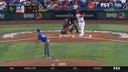 Dominican Republic's Eloy Jimenez rips an RBI single to left field for the early lead over Israel