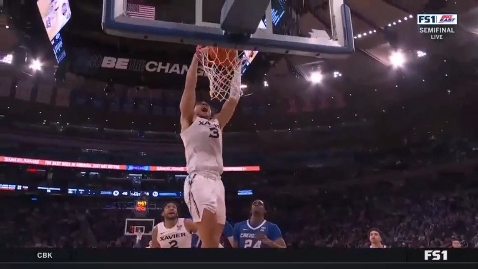 Xavier's Colby Jones throws down a two-handed slam