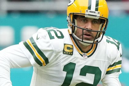 Out of dark, Rodgers vows decision coming soon