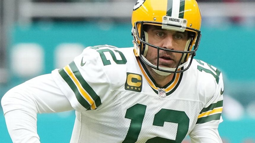 Out of dark, Rodgers vows decision coming soon