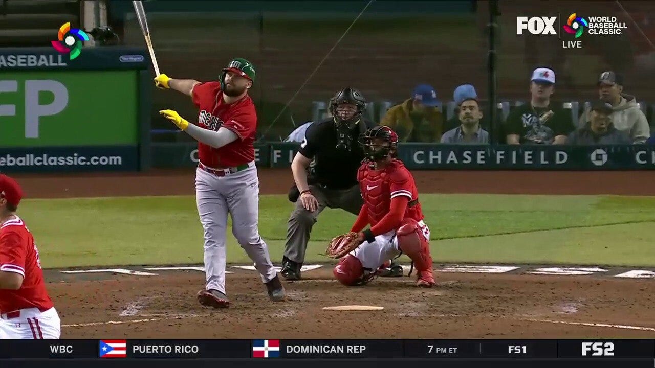 Rowdy Tellez LAUNCHES a home run to add to Mexico's lead over Canada, 10-3