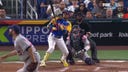 Venezuela's Luis Arraez crushes a two-run homer to cut the deficit against USA