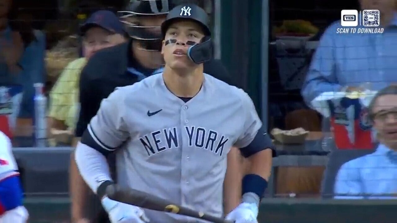 Aaron Judge appears to aggravate a hand injury on a swing, leaving the Yankees-Rangers game in the fourth inning