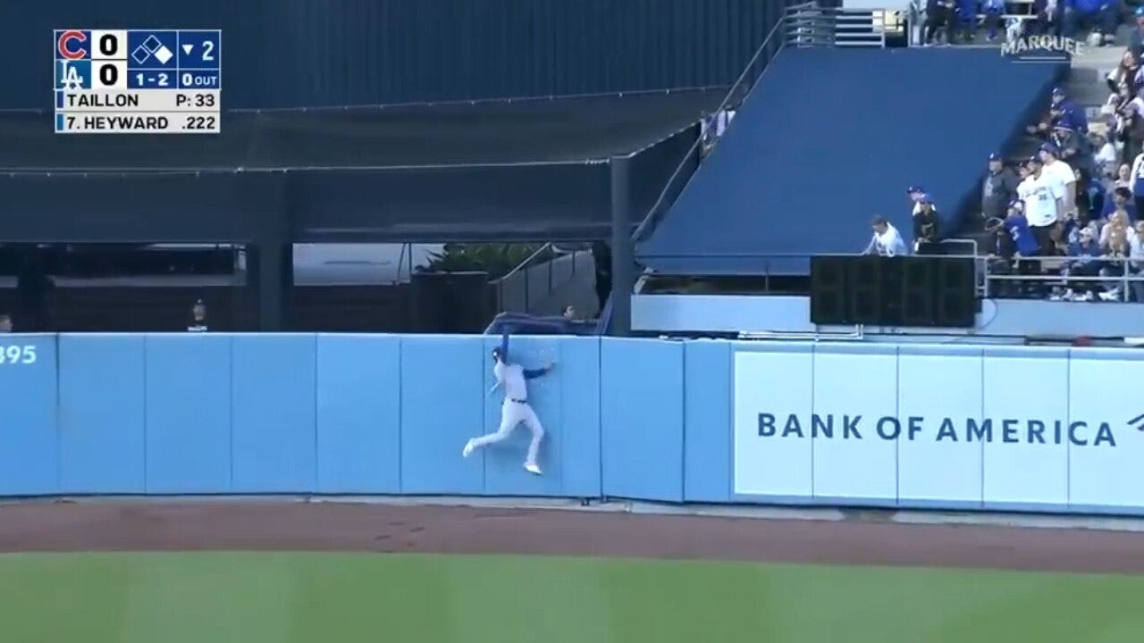 Cubs' Cody Bellinger robs the Dodgers' Jason Heyward of a two-run home run in the second inning