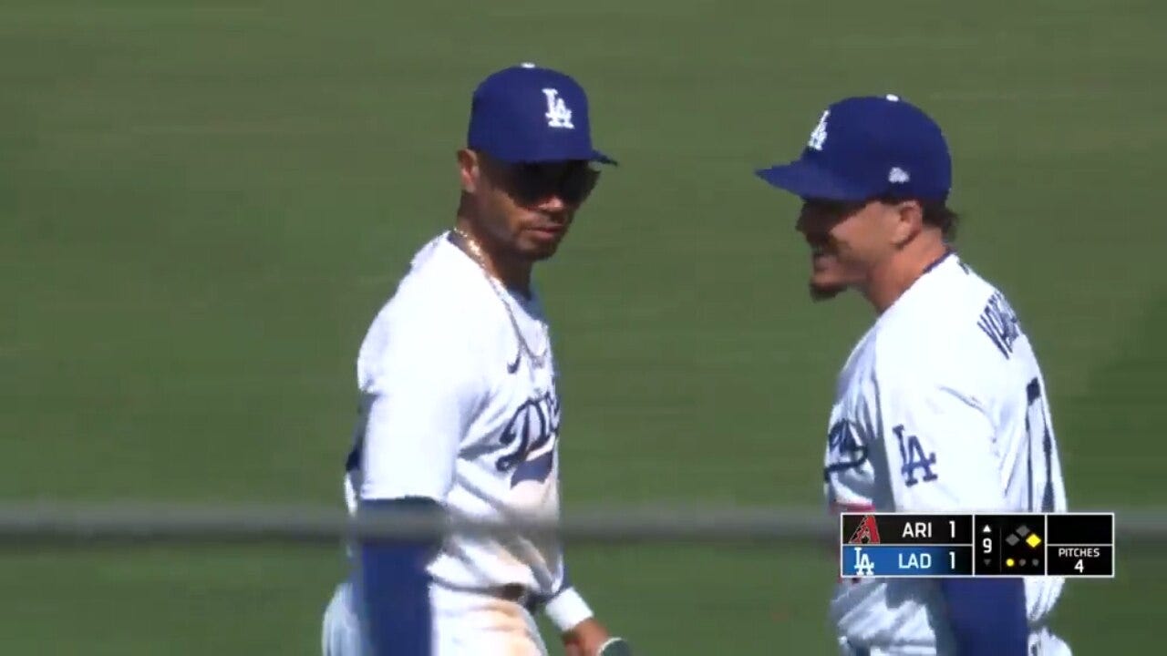 Dodgers' Mookie Betts throws a perfect ball to get Ketel Marte out at home plate