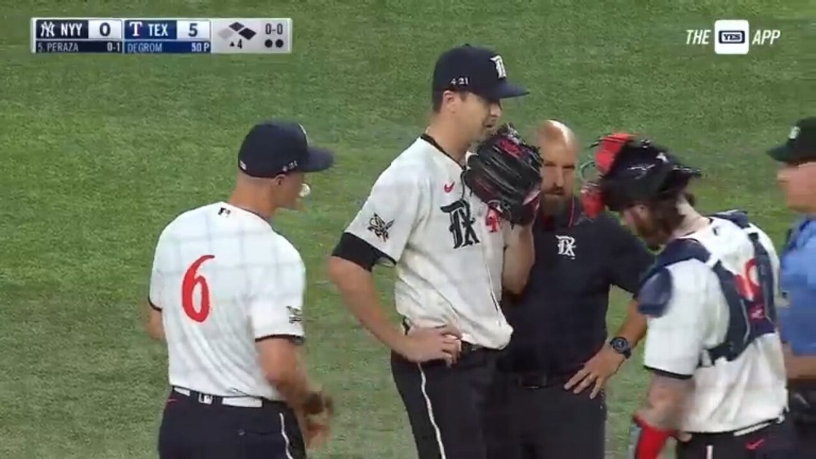 Jacob deGrom exits start after meeting with Rangers' athletic trainer