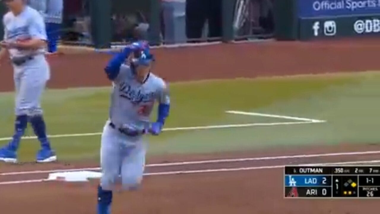 James Outman crushes a two-run homer to right, extending the Dodgers' lead over the Diamondbacks