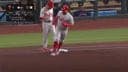 Phillies' Kyle Schwarber drives a solo home run deep to right against the Astros