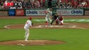 Phillies' Kyle Schwarber sends a solo homer 438 ft to center field against the Reds