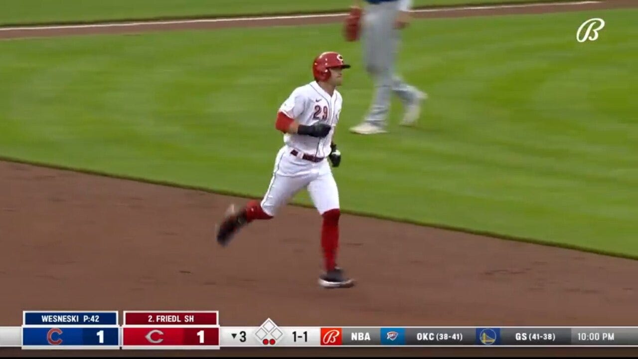 Tj Friedl drives in a solo homer for the Reds' early lead over the Cubs