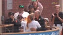 Giants fans show off their definition while getting married during Sunday's game at Oracle Park