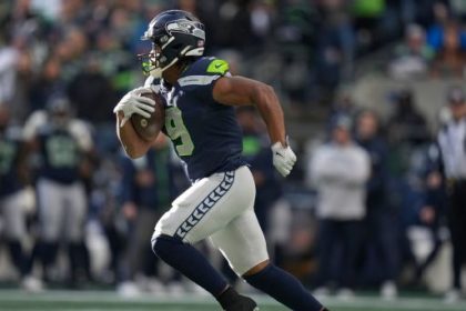 How will the Seahawks split carries in a stacked backfield?