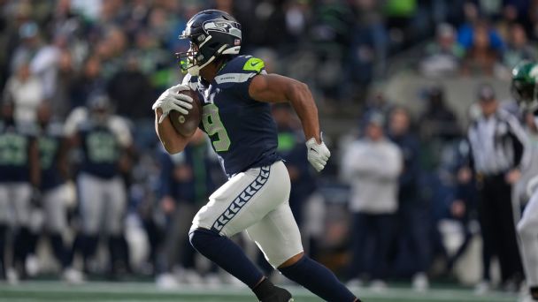 How will the Seahawks split carries in a stacked backfield?