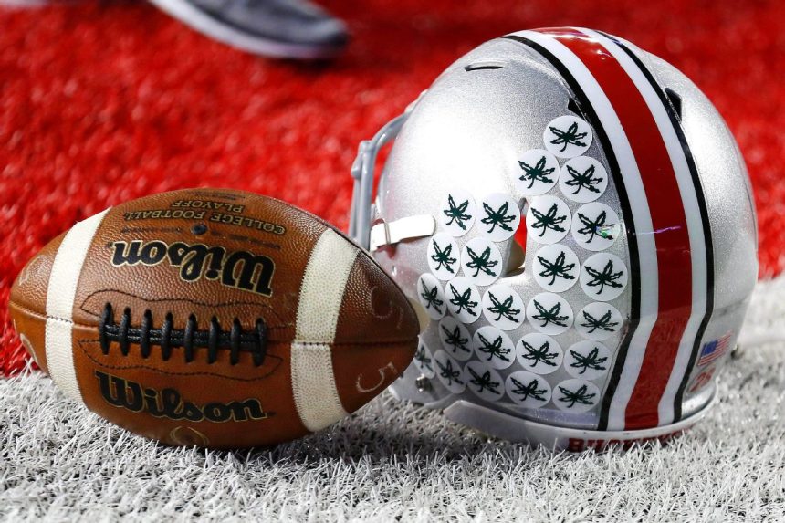 Henry Jr., adopted son of 'Pacman,' picks Ohio St.