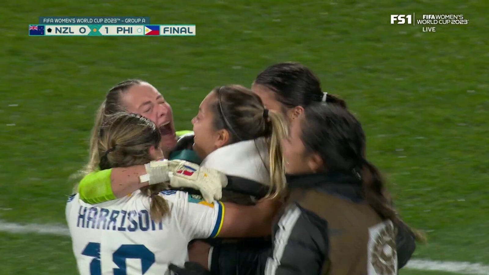 Philippines celebrate after earning their country's first World Cup win in history against New Zealand