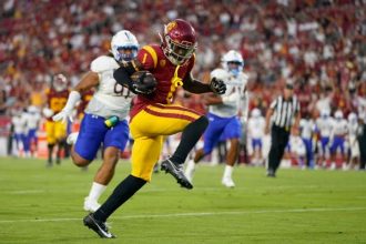 Freshman Branch's electric 2-TD debut lifts USC