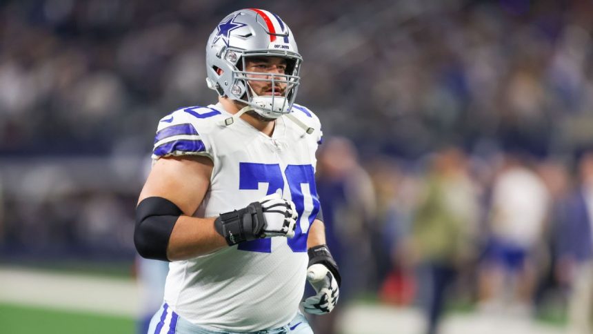 Holdout over, Cowboys' Martin 'grateful' for deal