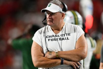 The hedge fund millionaire turned sleeveless college football coach: Meet Charlotte's Biff Poggi