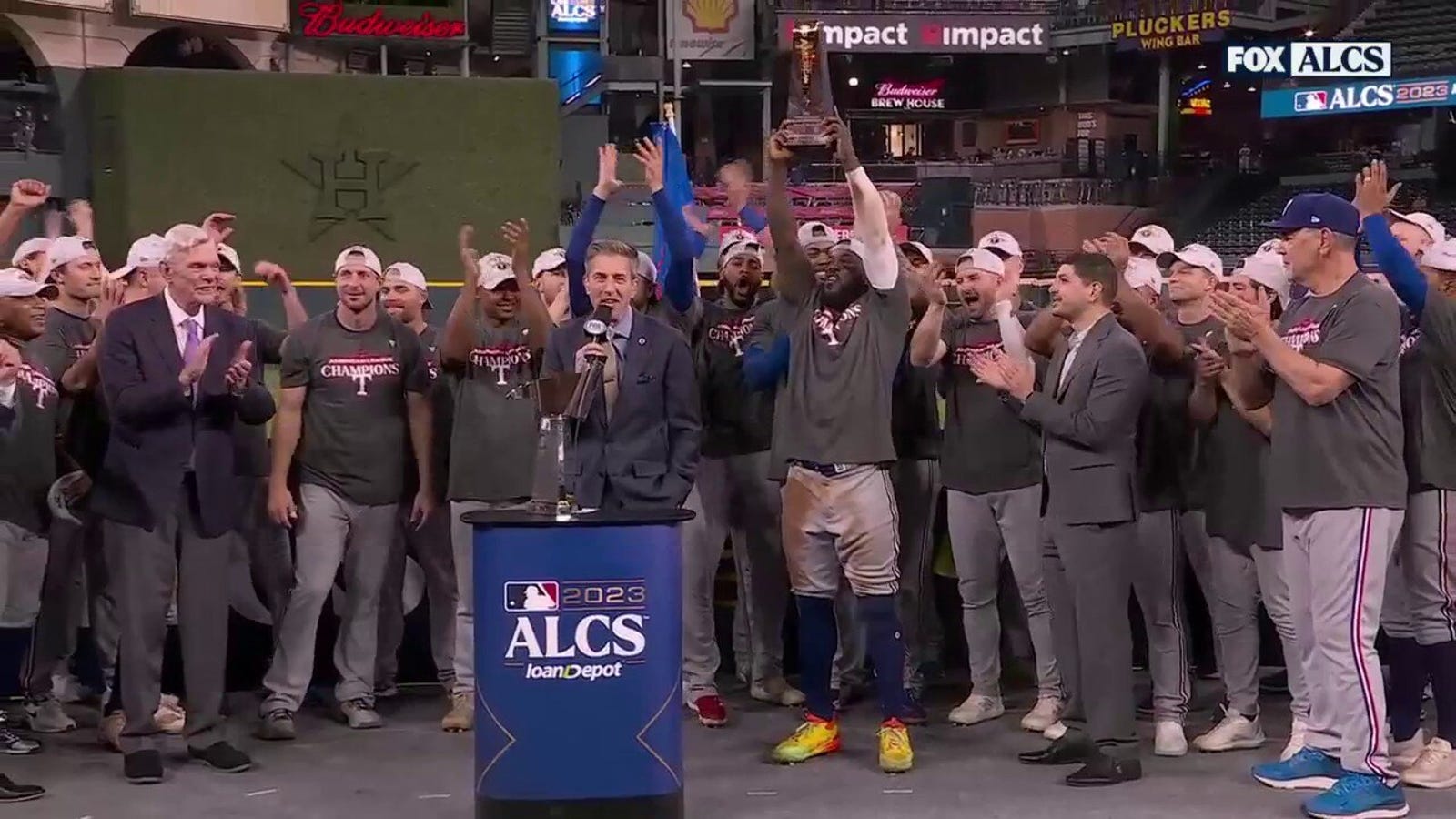 Rangers hoist trophy after winning ALCS; Adolis García wins MVP