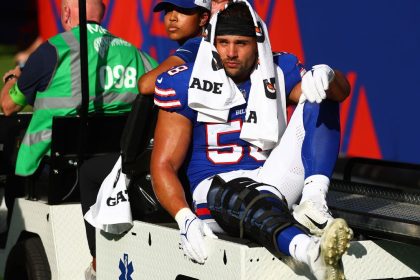 Bills' Milano carted off in London with knee injury