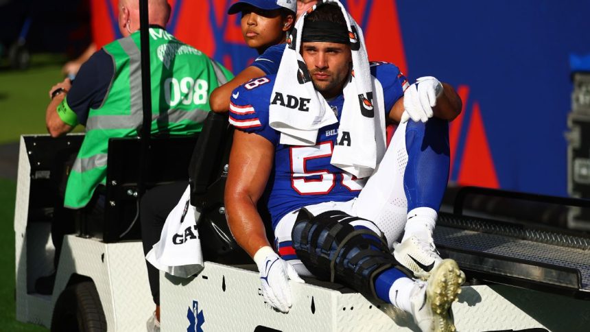 Bills' Milano carted off in London with knee injury