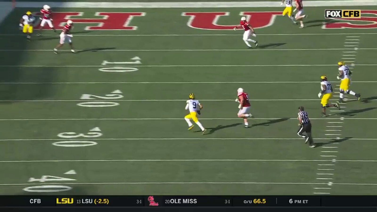 Michigan's J.J. McCarthy shows off ELITE elusiveness in 16-yard passing TD