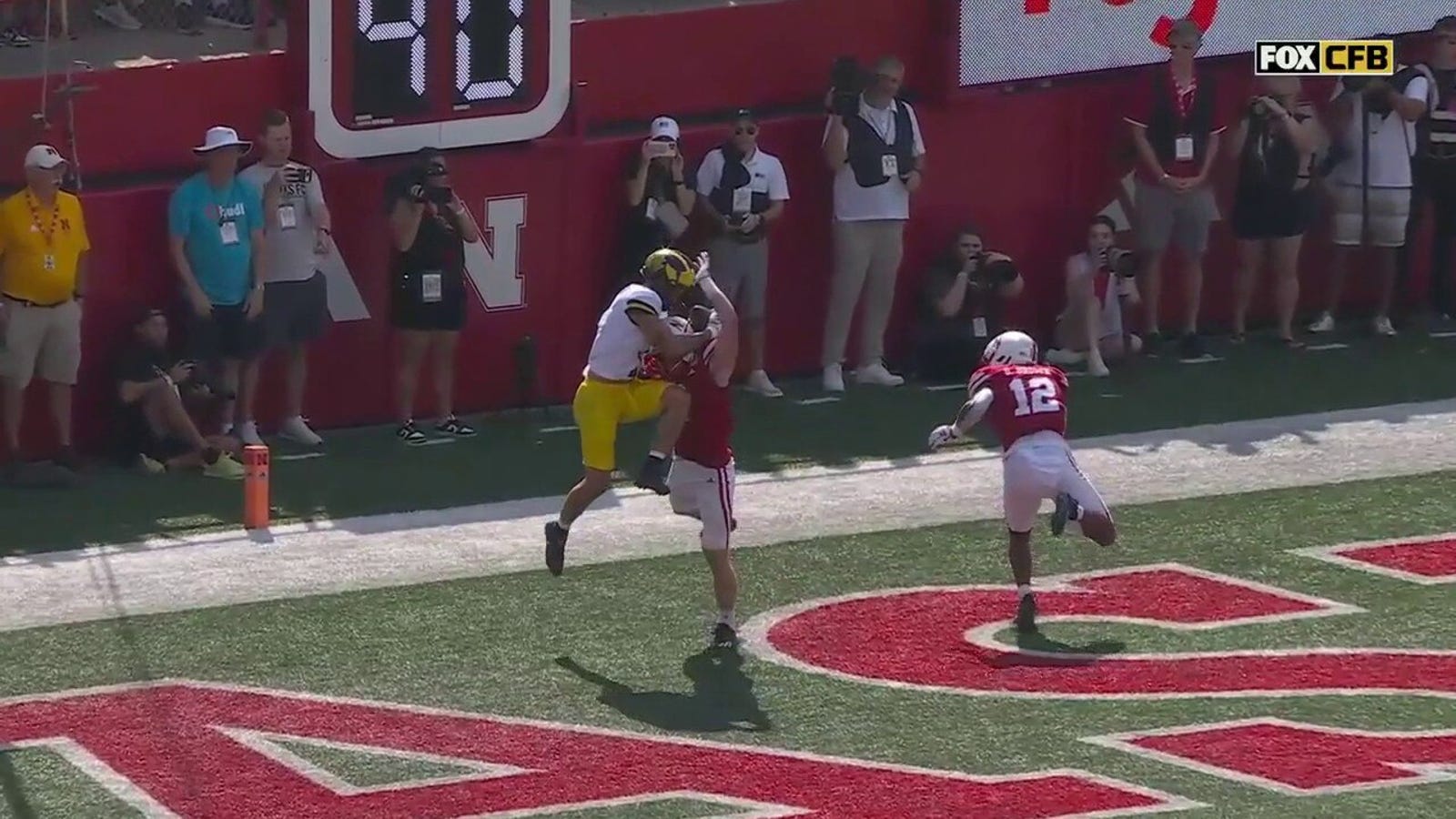 Roman Wilson makes an UNREAL contested TD reception vs. Nebraska