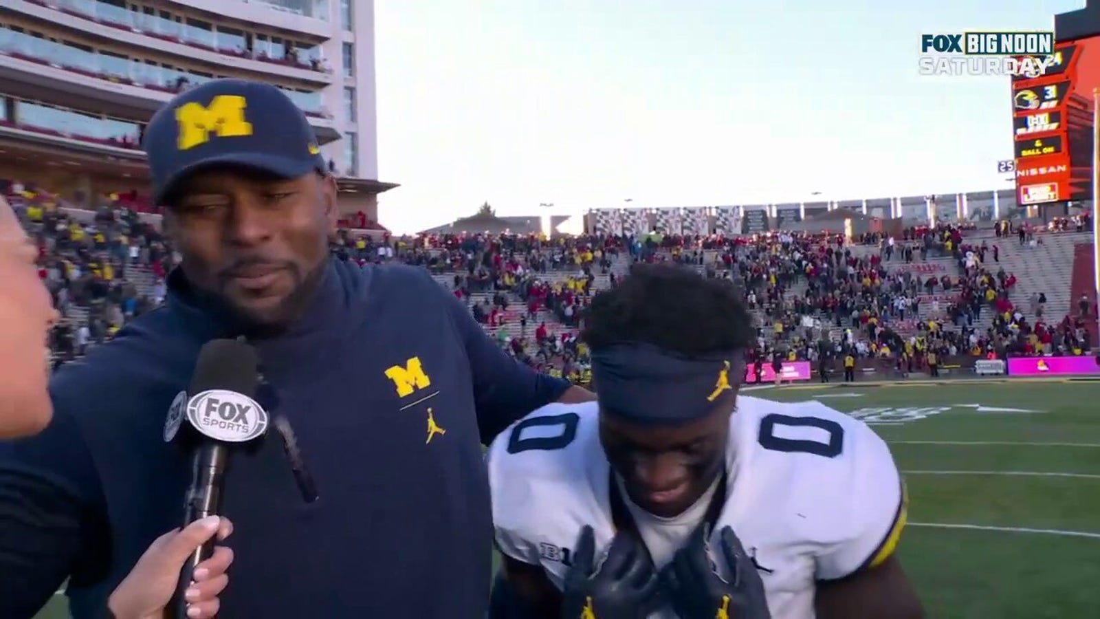 Sherrone Moore and Mikey Sainristil on Michigan's win