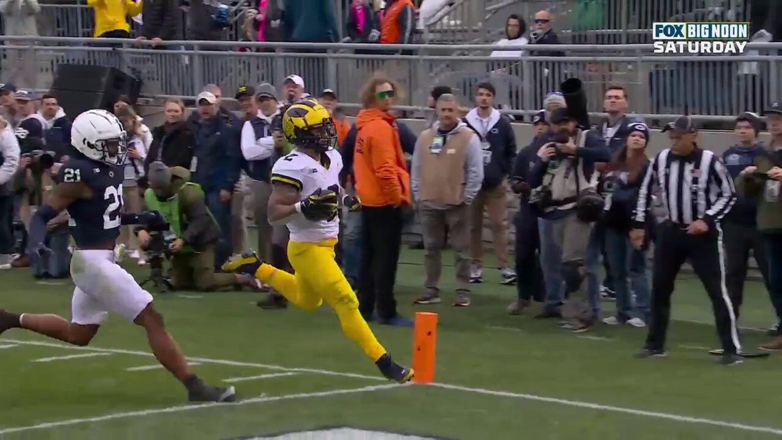 Michigan's Blake Corum rushes for a 30-yard TD