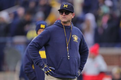 Big Ten bans Harbaugh from sideline amid probe