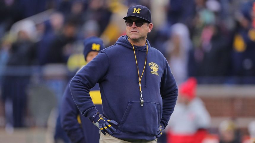 Big Ten bans Harbaugh from sideline amid probe
