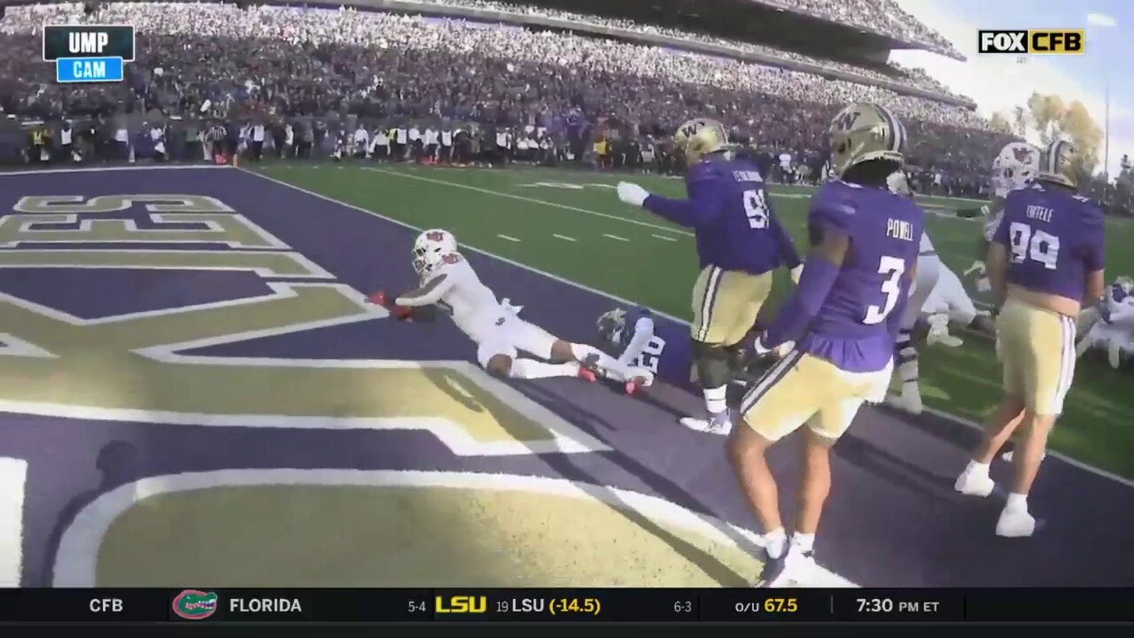 Utah's Ja'Quinden Jackson bulldozes past Washington's defense to tie the game 