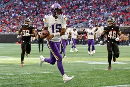 Dobbs replaces injured Hall, leads Vikings to win