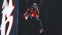 Ludacris rappels from ceiling while performing hit song during Falcons' win over Saints