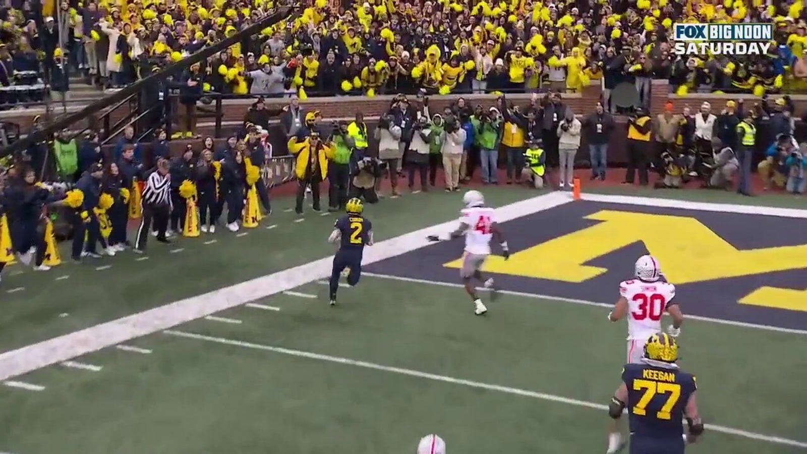 Michigan's Blake Corum rushes for a 22-yard TD