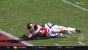 Oklahoma's Drake Stoops makes a diving leap for a touchdown on a nine-yard pass from Dillon Gabriel