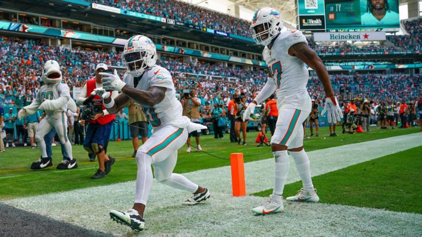 Dolphins' Hill to cover disciplined photog's pay