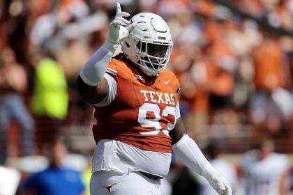 'He makes big people look small': The larger-than-life game, personality (and chain) of Texas' T'Vondre Sweat