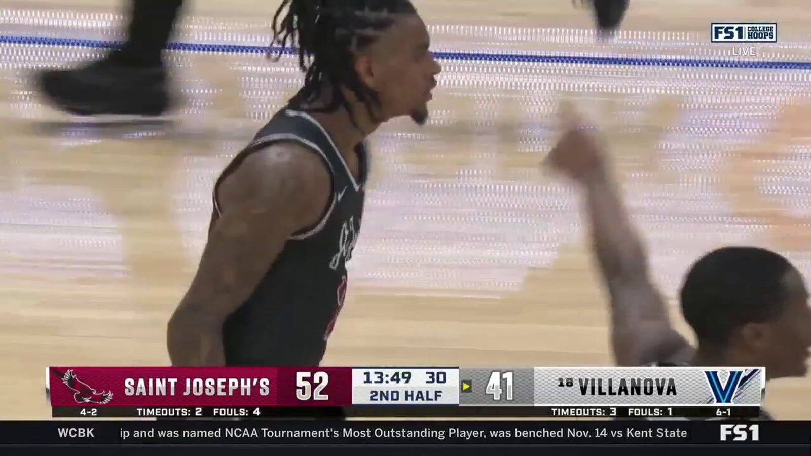 Erik Reynolds II buries the stepback 3-pointer to extend Saint Joseph's lead over Villanova