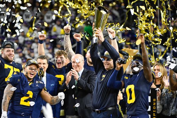 Champion Wolverines return home to joyous fans