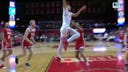 Derek Simpson rises for the tomahawk slam to trim Rutgers' deficit against Nebraska