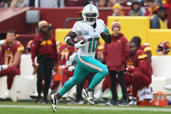 Hill back at Dolphins practice after fire at home