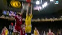 Owen Freeman rises for a strong two-handed slam to extend Iowa's lead over Nebraska