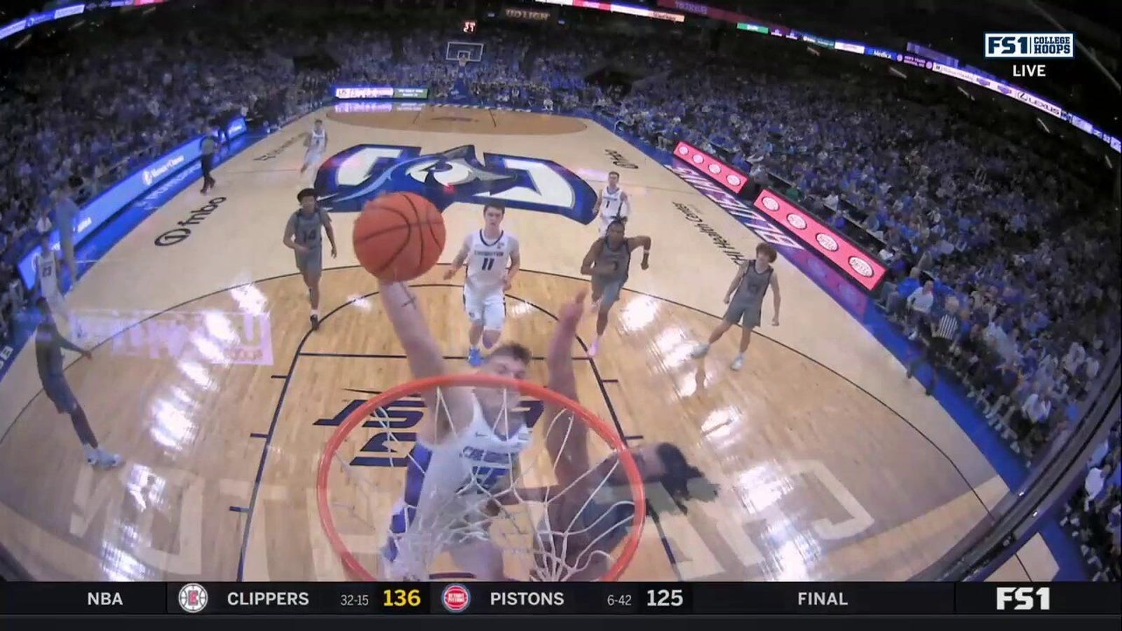 Creighton's Baylor Scheierman throws down a MONSTER one-handed poster slam against Butler