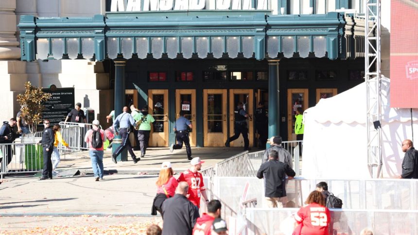 One dead as 22 shot near end of Chiefs' parade