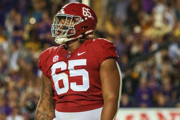 Bama's Latham wants NFL teams to try him at LT
