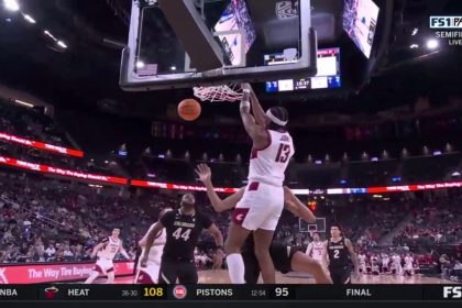 Isaac Jones throws down a two-handed slam to give Washington State an early lead over Colorado